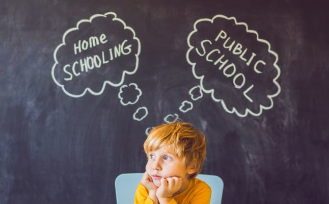 young boy with though bubbles thinking about Homeschooling vs Public School