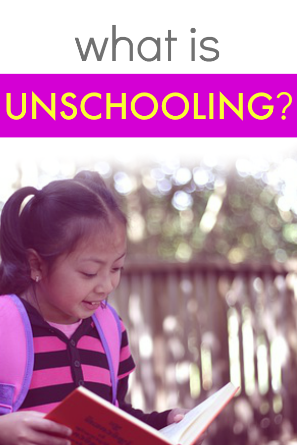 What Is Unschooling girl wearing a backpack and reading a book outdoors