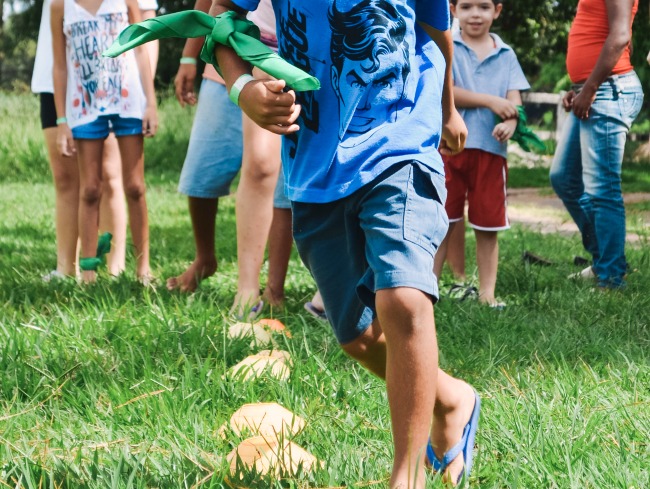 REAL Truth About Homeschool Socialization As One of the Homeschool Disadvantages : kids legs running through an obstacle course