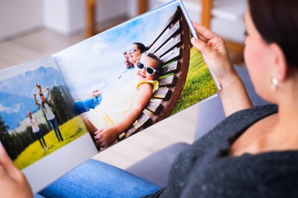 homeschooling mom looking at yearbook ideas for homeschool