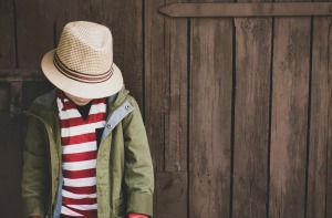 Can You Start Homeschooling at the End of the Year? boy wearing hat with head down
