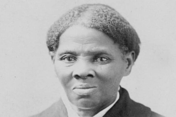 Harriet Tubman lessons for kids with black and white picture of Harriet Tubman staring into the camera