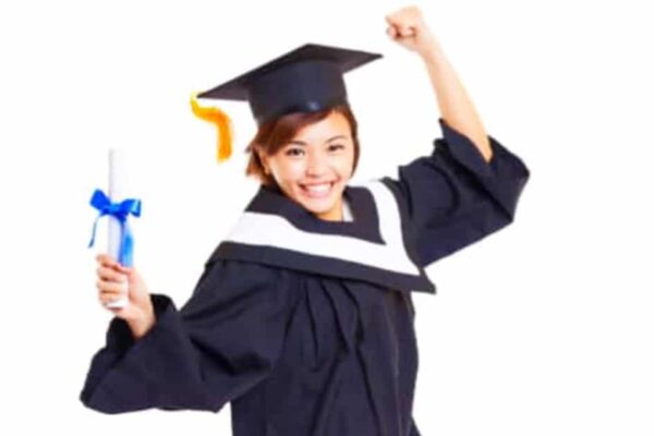 Graduation high school homeschool requirements (How does my high school student graduate from home school?) female homeschool high school graduate in cap and gown jumping up in air